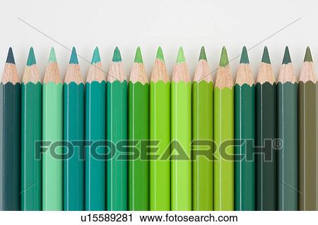 Stock Image - Colored pencils in shades of green. Fotosearch