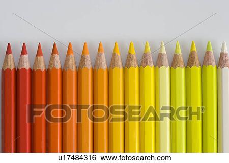 Colored pencils in shades of yellow and red View Large Photo Image Stock Photograph - Colored pencils in shades of yellow and red. Fotosearch