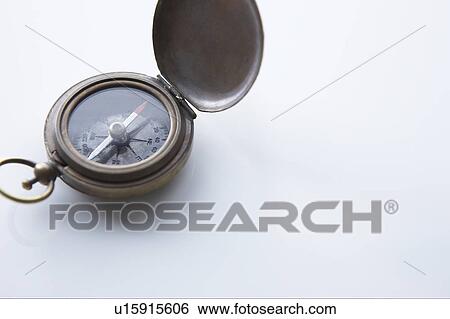 Stock Photograph - Compass on white background. Fotosearch
