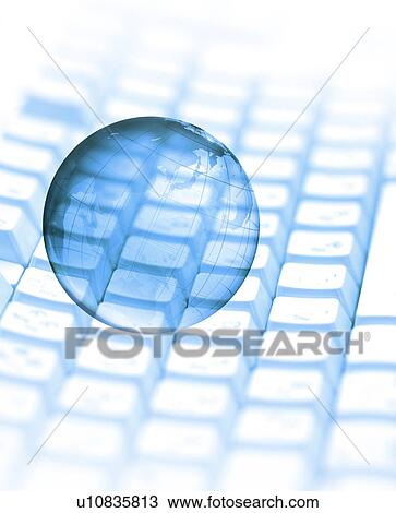 Stock Image - Computer generated image of a globe over a keyboard. Fotosearch