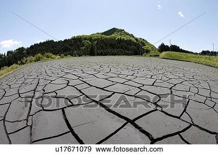 Stock Photo - Cracked dry rice field, Nikko, Tochigi Prefecture, Japan. Fotosearch