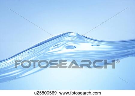 Stock Photo - Cross section of water, close up, blue background. Fotosearch