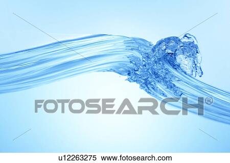 Stock Photography - Cross section of water, close up, blue background. Fotosearch