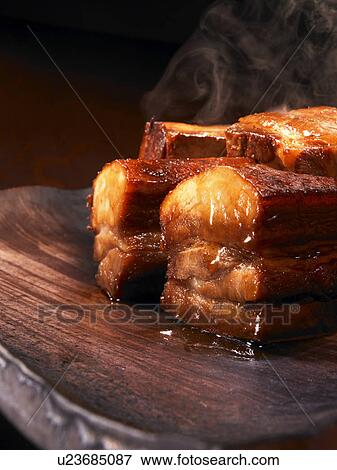 Cuts of pork boiled with sugar, soy sauce, sweet sake and salt View Large Photo Image Stock Photo - Cuts of pork boiled with sugar, soy sauce, sweet sake and salt. Fotosearch