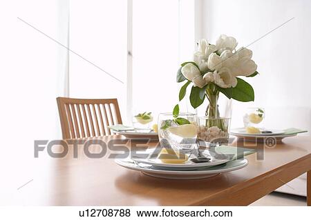 Dining table with plates and glasses View Large Photo Image Stock Photo - Dining table with plates and glasses. Fotosearch