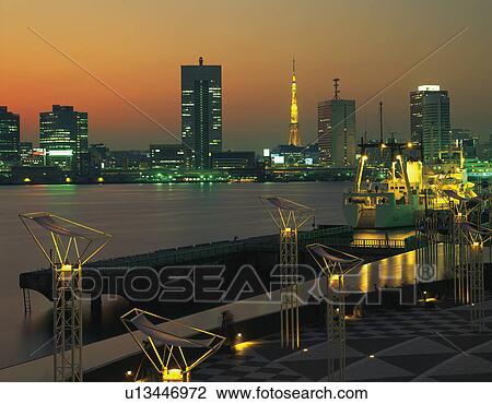 Stock Image - Dock and Tokyo skyline with the Tokyo Tower, Tokyo Japan. Fotosearch