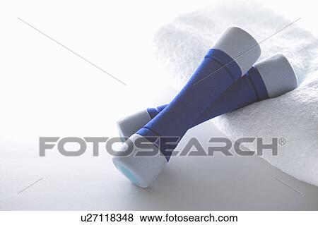 Dumbbells and a towel View Large Photo Image Stock Photo - Dumbbells and a towel. Fotosearch