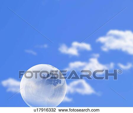 Earth in a blue cloud filled sky View Large Photo Image Stock Image - Earth in a blue cloud filled sky. Fotosearch