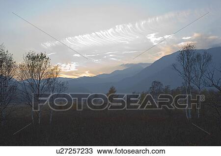 Evening glow over mountains. Tochigi Prefecture, Japan View Large Photo Image Stock Image - Evening glow over mountains. Tochigi Prefecture, Japan. Fotosearch