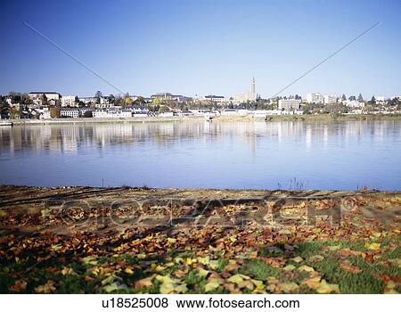Fallen leaves by the Loire river and the Blois skyline, Loire Valley, France View Large Photo Image Stock Photo - Fallen leaves by the Loire river and the Blois skyline, Loire Valley, France. Fotosearch