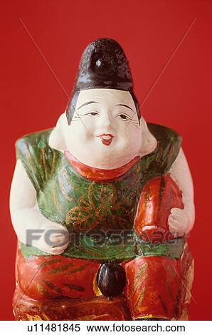 Stock Photography - Figurine of Ebisu, one of the seven lucky Gods. Fotosearch