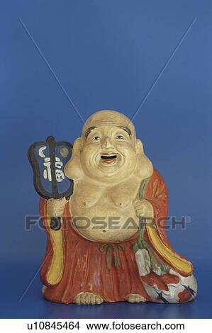 Picture - Figurine of Hotei, one of the seven lucky Gods. Fotosearch
