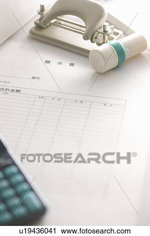 Stock Image - Financial document with office stationery. Fotosearch