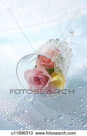 Flowers in a wine glass View Large Photo Image Stock Image - Flowers in a wine glass. Fotosearch