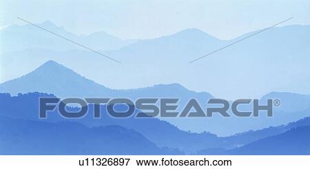 Stock Photo - Fog over mountain range. Fotosearch