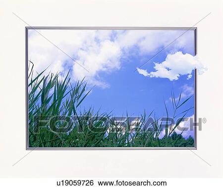 Stock Photograph - Framed photo of cloudscape. Fotosearch