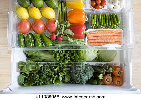 Fridge drawers full of vegetables View Large Photo Image Stock Photo - Fridge drawers full of vegetables. Fotosearch