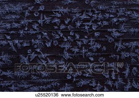 Stock Photograph - Frost on wooden planks. Fotosearch