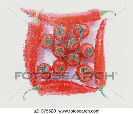 Stock Image - Frozen chilli peppers and cherry tomatoes. Fotosearch