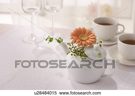 Stock Photography - Gerberas in a teapot. Fotosearch