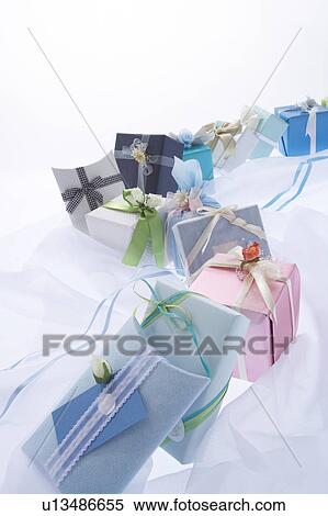 Gifts in a row View Large Photo Image Stock Photography - Gifts in a row. Fotosearch