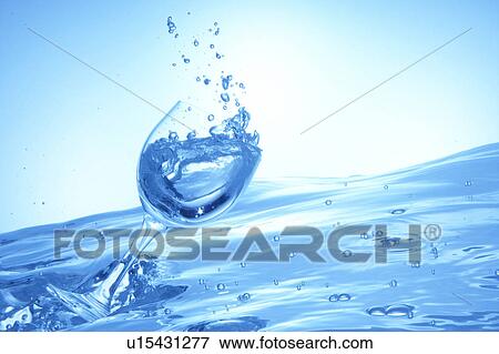 Glass of water falling on water surface, blue background View Large Photo Image Stock Photo - Glass of water falling on water surface, blue background. Fotosearch