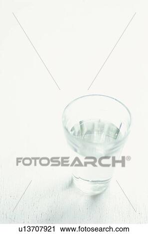 Glass of water on white background View Large Photo Image Stock Image - Glass of water on white background. Fotosearch