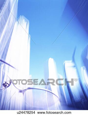 Picture - Glasses and blurred skyscrapers. Fotosearch