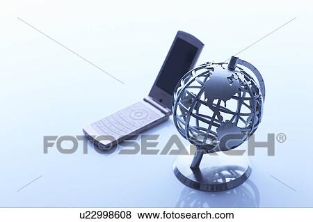 Globe and a cellphone View Large Photo Image Stock Photo - Globe and a cellphone. Fotosearch