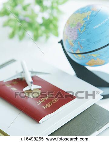 Globe, miniature plane and travel documents View Large Photo Image Stock Photography - Globe, miniature plane and travel documents. Fotosearch