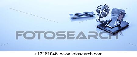Stock Photograph - Globe with business accessories. Fotosearch