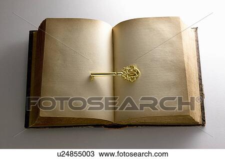 Gold key on antique book View Large Photo Image Stock Image - Gold key on antique book. Fotosearch