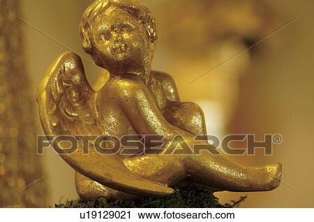 Stock Image - Golden cherub. Fotosearch