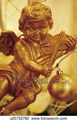Stock Image - Golden cherub. Fotosearch