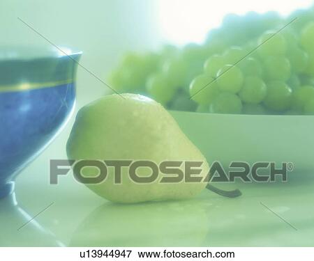 Grapes and a pear View Large Photo Image Stock Photo - Grapes and a pear. Fotosearch