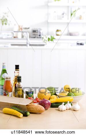 Stock Image - Groceries on a kitchen counter. Fotosearch