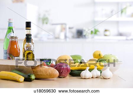 Stock Image - Groceries on a kitchen counter. Fotosearch