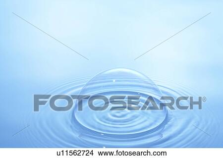 Half of soap bubble on water surface, blue background View Large Photo Image Picture - Half of soap bubble on water surface, blue background. Fotosearch