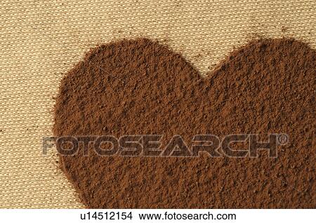 Picture - Heart made of cocoa powder. Fotosearch