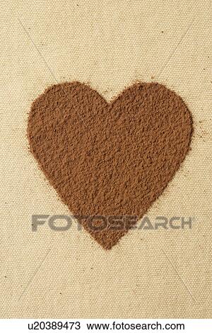 Heart made of cocoa powder View Large Photo Image Stock Image - Heart made of cocoa powder. Fotosearch