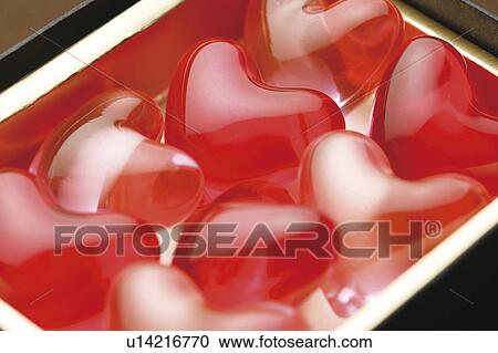 Stock Image - Heart shaped bath beads in a gift box. Fotosearch