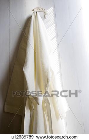 Stock Photo - Hemp bathroom hanging on a clothes hook. Fotosearch