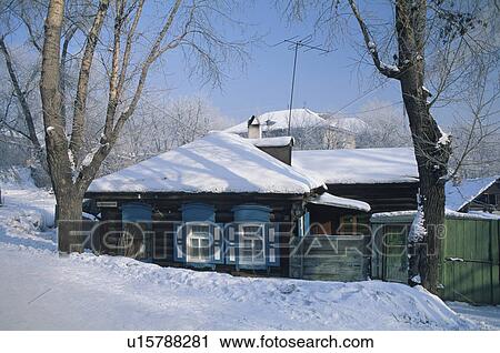 Stock Image - House in snow, Irkutsk, Russia. Fotosearch