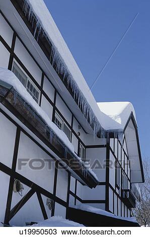 Icicles hanging off roof of house View Large Photo Image Stock Image - Icicles hanging off roof of house. Fotosearch