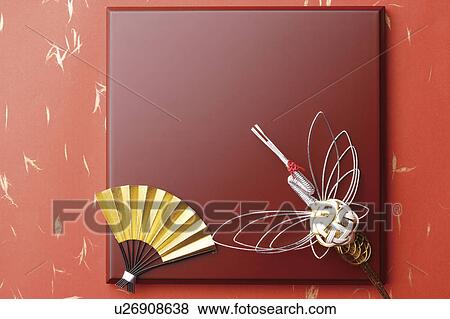 Stock Photo - Japanese fan and mizuhiki crane. Fotosearch