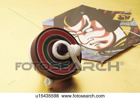Japanese spinning top and samurai kite View Large Photo Image Stock Photo - Japanese spinning top and samurai kite. Fotosearch