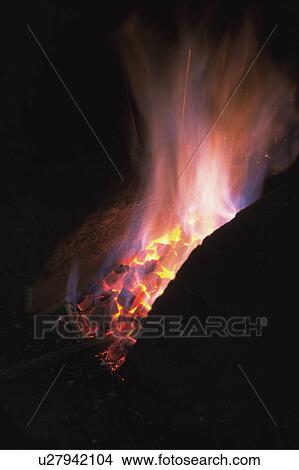 Picture - Japanese sword being made. Fotosearch