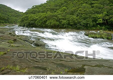 Stock Image - Kampire Waterfall, Iriomote Island, Okinawa Prefecture, Japan. Fotosearch