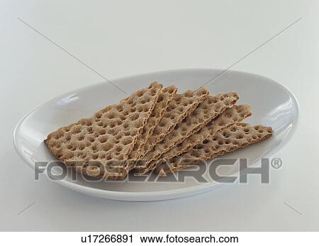 Stock Image - Knackebrot on plate. Fotosearch