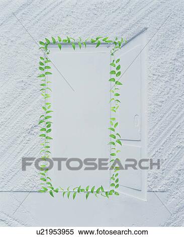 Stock Photography - Leaves framing a textured white door. Fotosearch